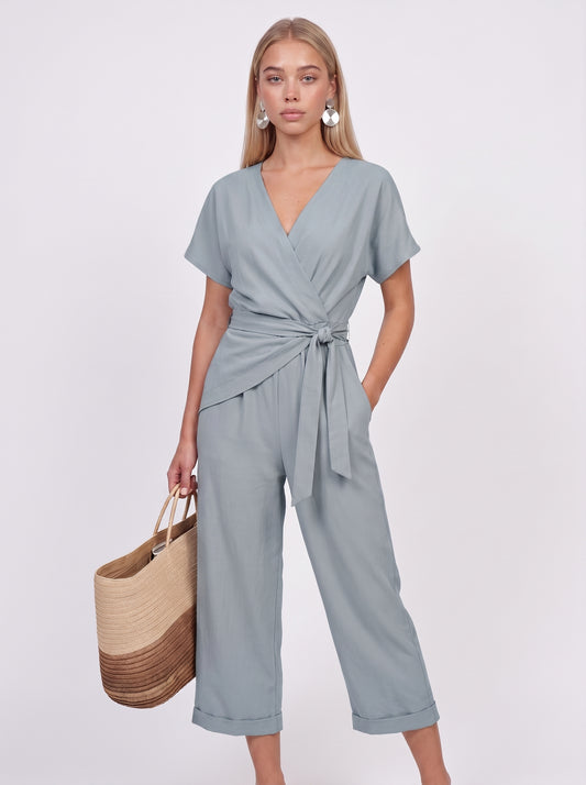 Nora | Elegant Wrap Jumpsuit with Twisted Waist Detail — Blue_front