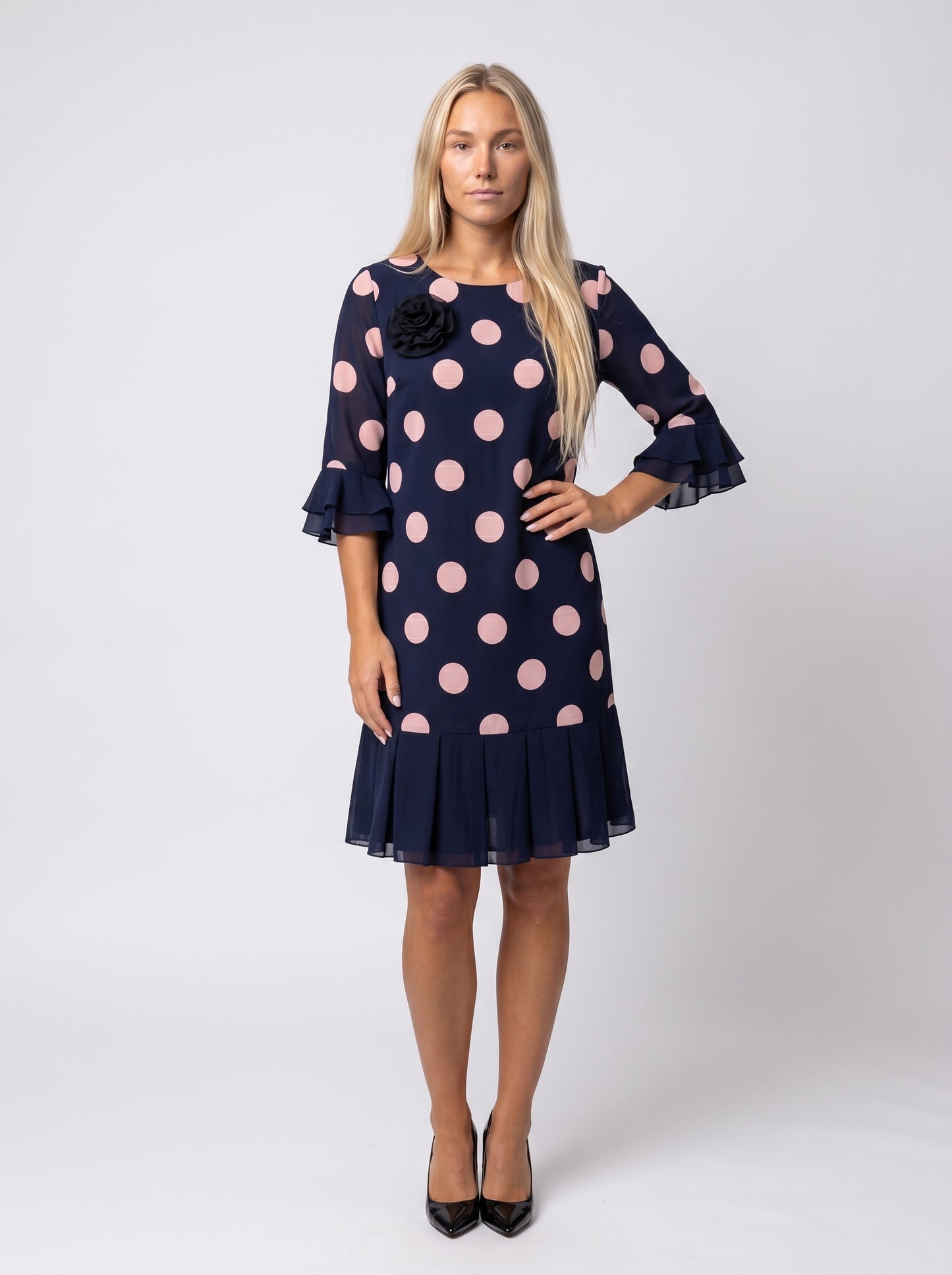 Stella | Charming Polka Dot Midi Dress with Flared Hem & Bell Sleeves — Pink_front